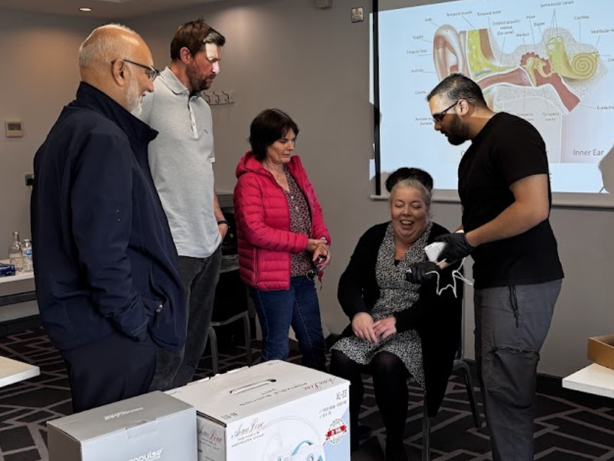 UK ear wax removal training group session in progress